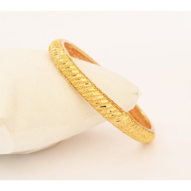 Gold plated shiny cut bangle - Bangle by Shrayathi