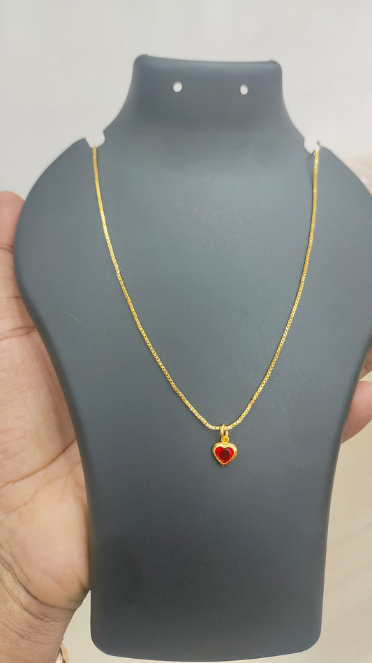 Gold plated chain and red stone pendant
