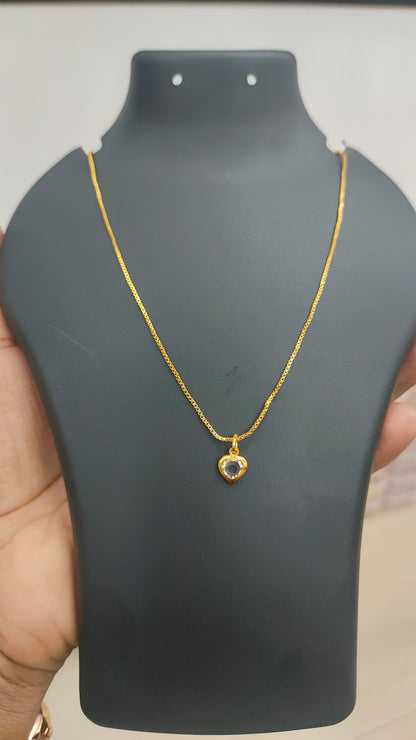 Gold plated chain and white stone pendant