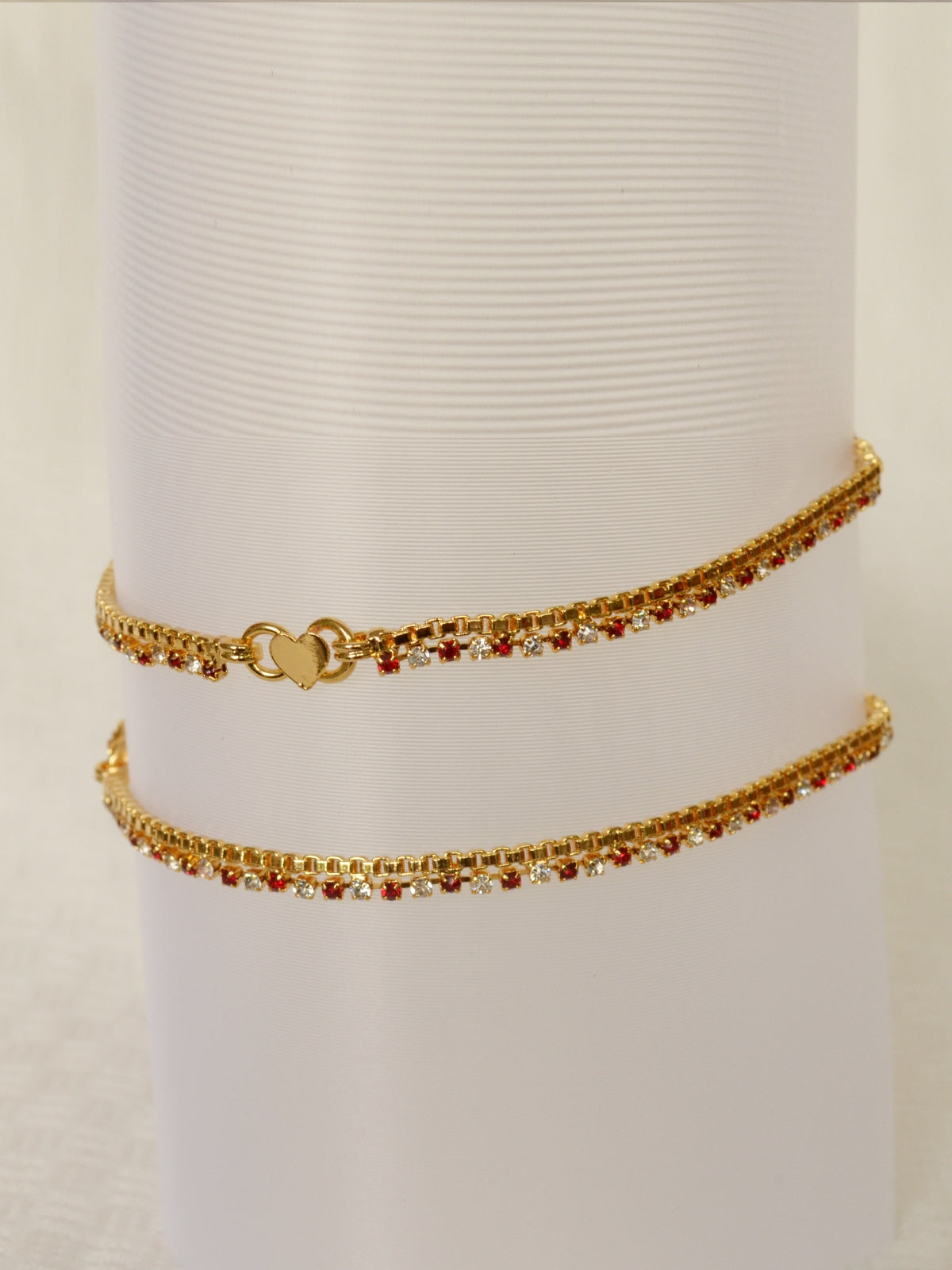 Gold plated anklet with maroon and white stones -  by Shrayathi